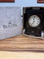 Clock in original Bulova box, front view