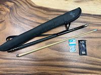 Complete lot with cue assembled, case, accessory pack, VOKS dart set