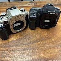 Front view of both Canon camera bodies without lenses
