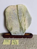 Front view of stone showing shape and color patterns with dimension notes