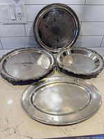 All four trays arranged on countertop