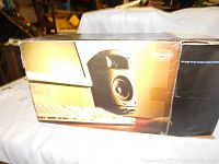 Front side of the original box showing a speaker and keyboard with the Klipsch brand and promotional tagline 'Welcome to the ultimate sound experience'.