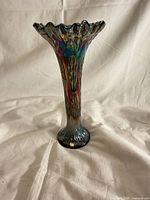 Full view of cobalt blue iridescent swung vase showing ruffled rim and knotted bead pattern