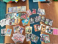 overhead view of assorted baseball cards spread on table
