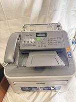 Top view showing control panel, handset and output tray