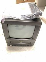 Front view of Citizen 9" CRT TV/VCR with remote on top