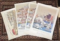 Group shot of all four offset lithograph posters laid out on rug