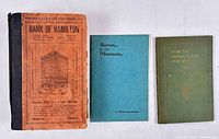 Front covers of all three volumes
