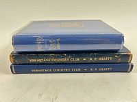 Spine view of three volumes stacked