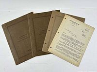 Three financial statement booklets and one audit letter laid out