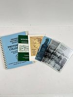 All seven booklets laid out front covers visible