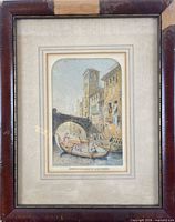 Close view of framed lithograph showing print, mat and portion of wooden frame