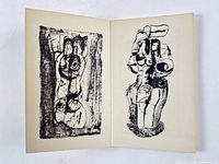 Open spread showing two of the original lithographs