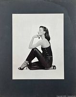 Frontal view of entire mounted photograph