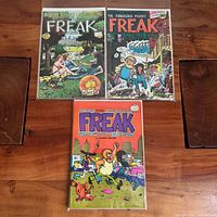 All three Freak Brothers comics bagged and board on table