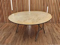 Full view of tabletop surface showing plywood finish and writing