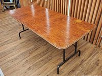 Table top surface showing woodgrain and overall condition