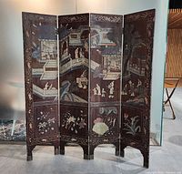 Front view of four-panel Coromandel screen showing court scene decoration