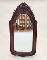 Full front view of carved teak mirror