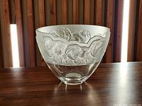 Front view of crystal bowl showing frosted elephant frieze and clear lower section