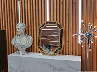 Mirror front view with surrounding decor