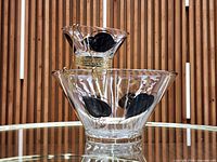 large and small glass bowls assembled with wire holder