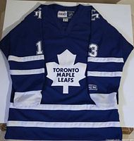 Front view showing team crest and number 13