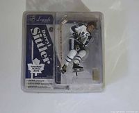 Front view of sealed Darryl Sittler action figure in packaging