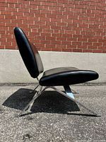 Side view showing low profile seat, back and chrome X-legs