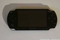 Front view of black Sony PSP handheld console