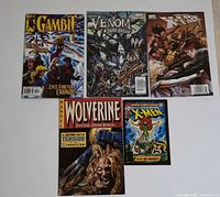 Front covers of five Marvel comic books laid out on white background