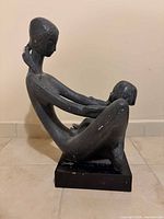 Full side view of stone sculpture