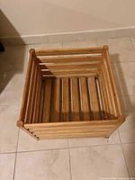 Top view of empty wooden slatted crate