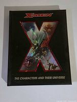 Front cover of hardcover book featuring red X and artwork