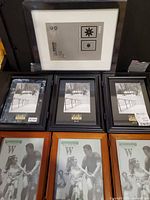 All frames front view, showing triple black wood, triple brown wood, single black plastic, single IKEA black wood