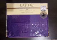 Front view of sealed Lauren Ralph Lauren Dunham Sateen 300 thread count purple full sheet set package