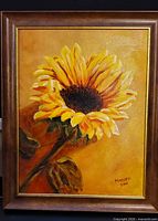 Full view of framed sunflower oil painting, signature visible
