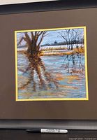 Framed square pastel depicting tree at lake with reflection