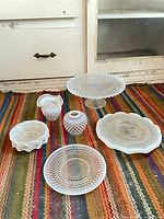 Entire set on rug showing all pieces