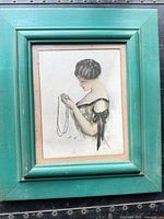 Full view of framed print showing teal frame, mat, entire artwork