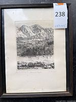 Full view of framed etching showing subject and frame