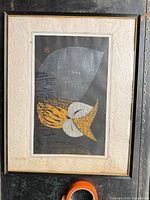 Full view of framed print showing artwork, mat and frame