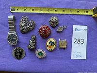 All ten items laid out with measuring tape