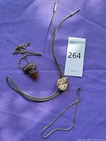 All three jewellery pieces laid out