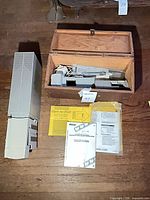 Scanner unit, wooden box with accessories, manuals visible