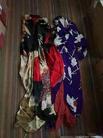 Both kimonos folded together on floor