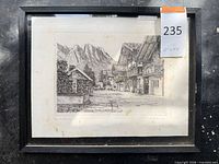 Full view of framed etching under glass