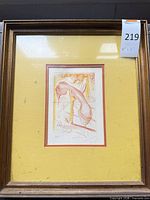 Full framed artwork showing mat, frame, auction tag
