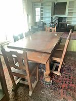 table and chairs full view in room