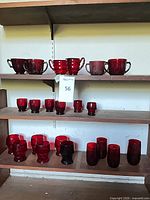 Shelved assortment showing all ruby red drinkware pieces